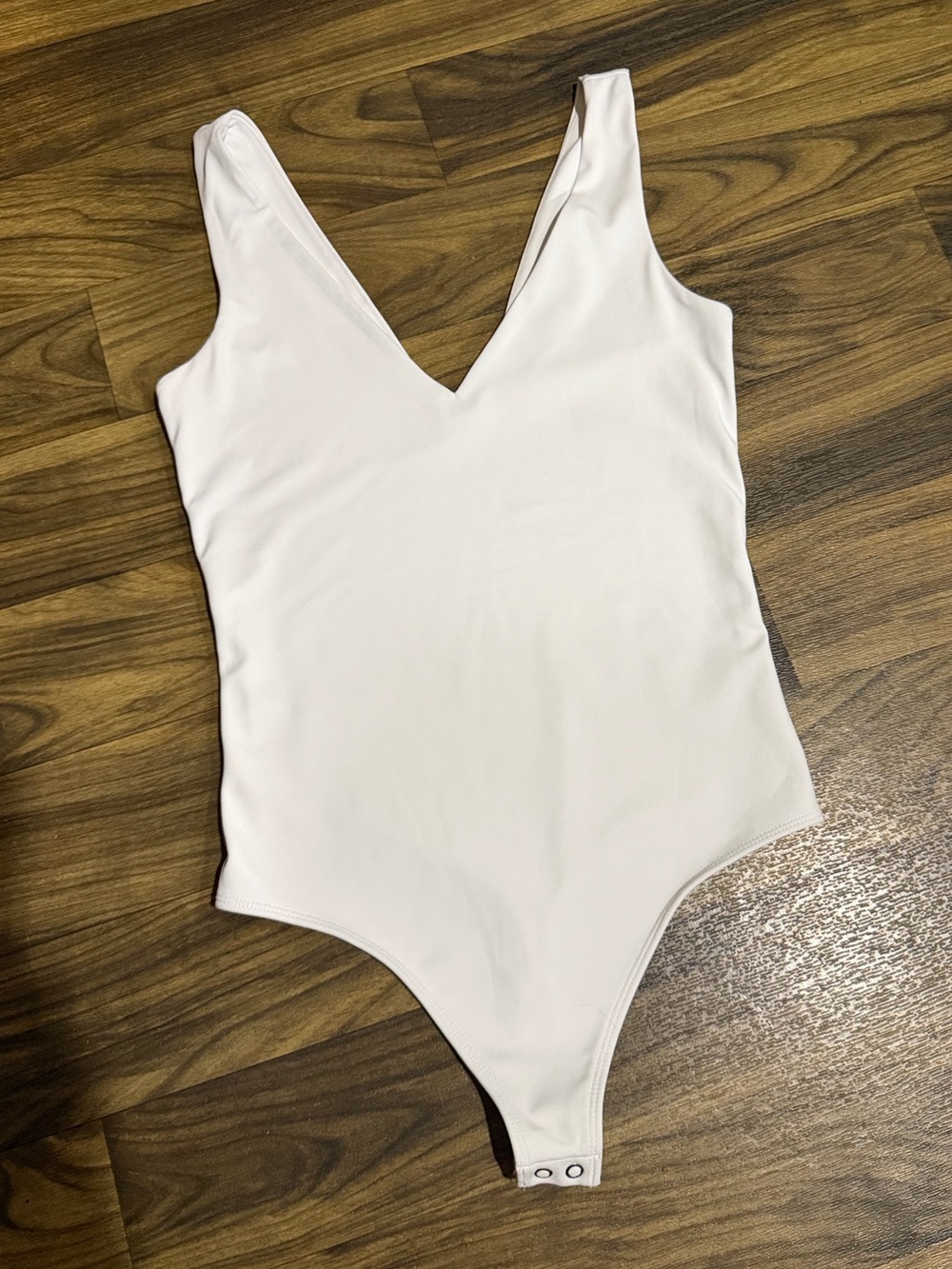 Woman’s Express Body Contouring  White low cut V-Neck Bodysuit
